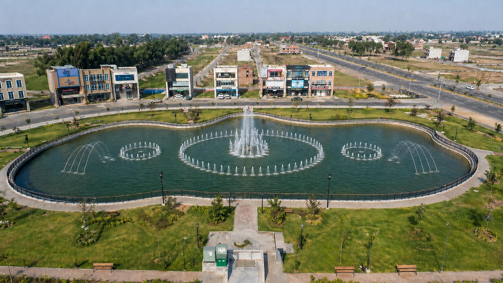 Daytime dancing fountain for a real estate artificial lake project with landscape water effects
