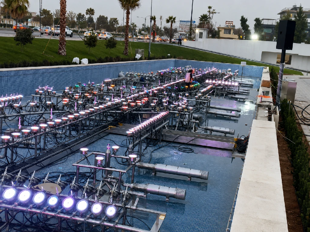 Lighting installation and testing for the Grand Majidi Mall dancing fountain project in Erbil, Iraq