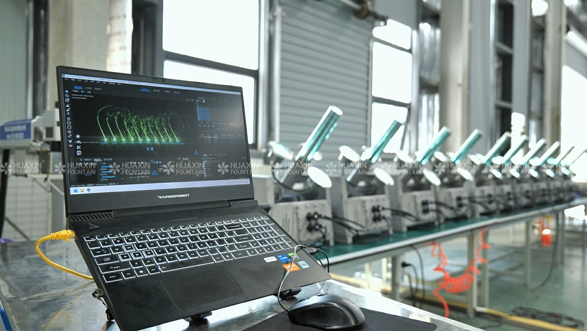 Engineer programming a music-synchronized fountain show
