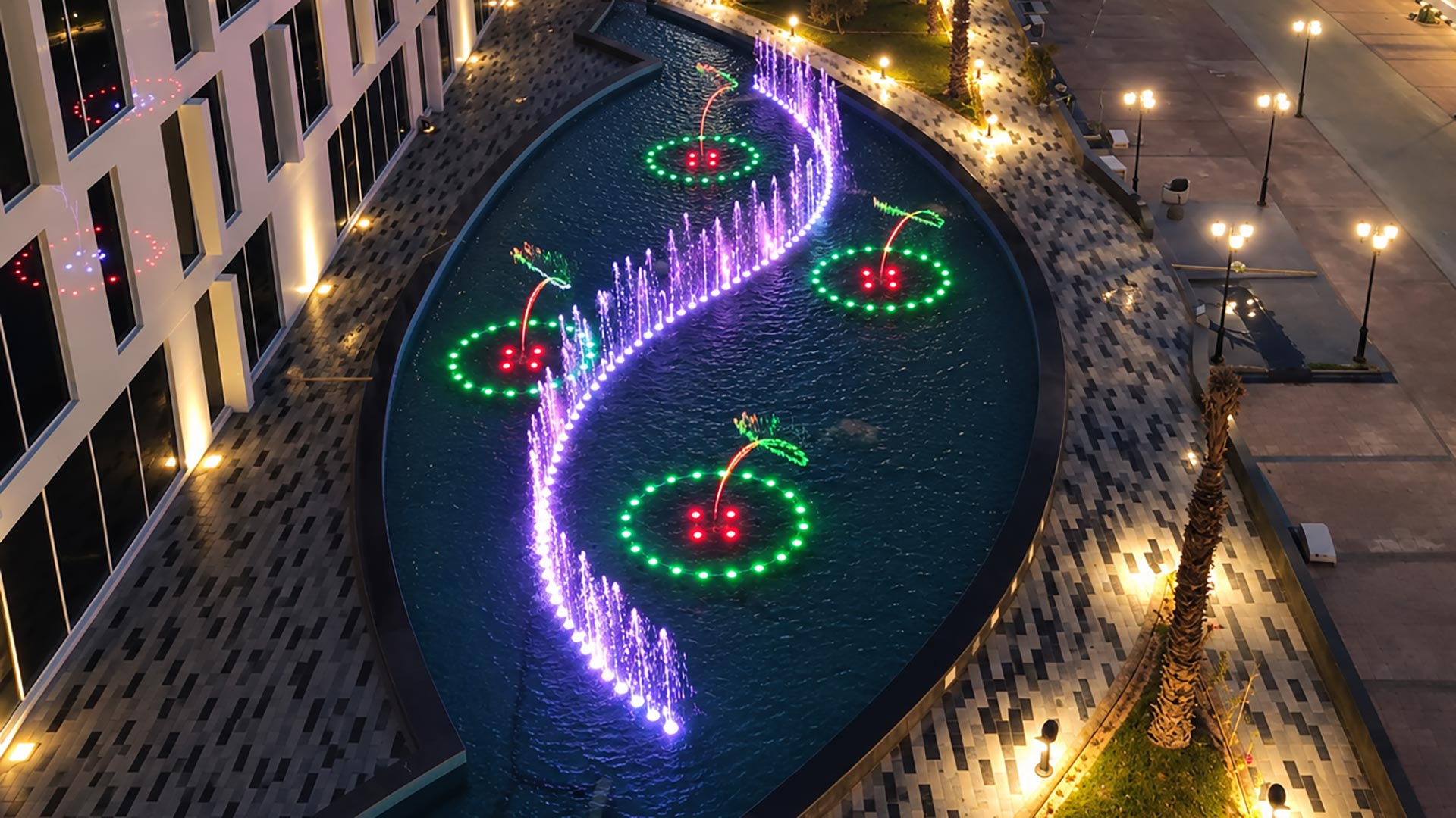Illuminated water jets at the completed Al Ammar Avenue Commercial Plaza fountain in Saudi Arabia