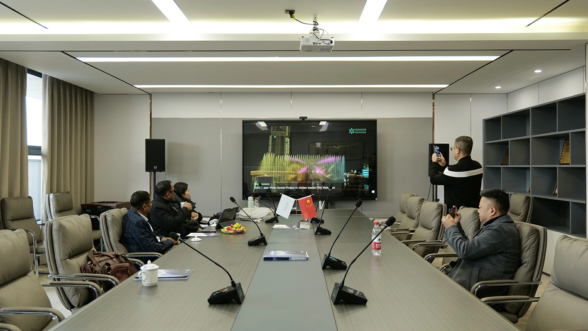 Meeting with a client to discuss fountain project requirements and supplier support