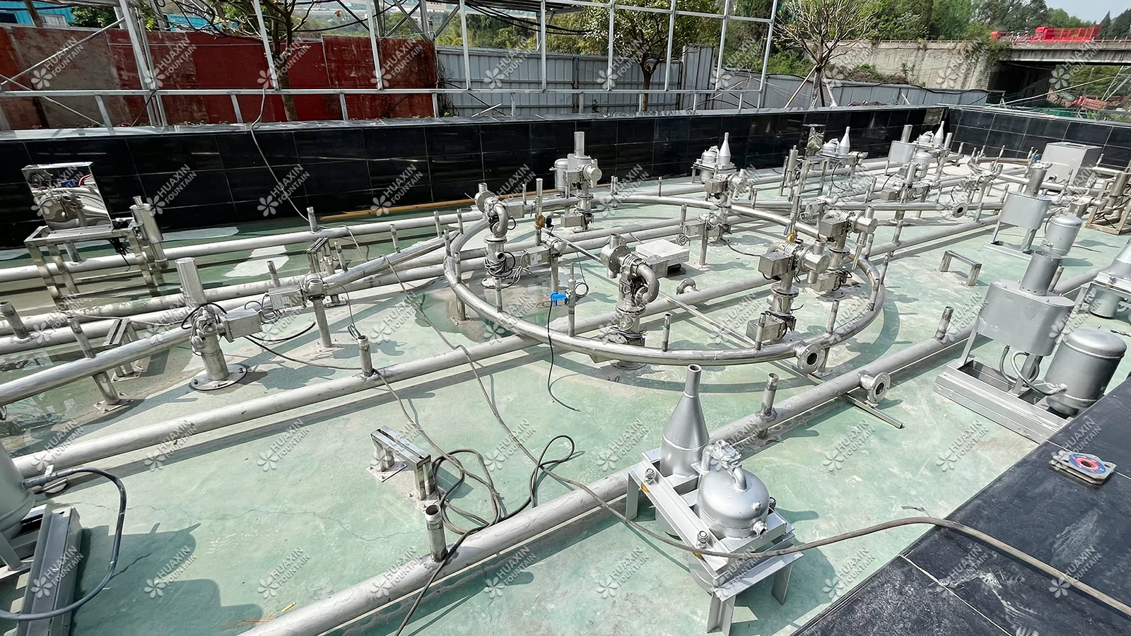 Site photo showing pool structure and water depth conditions for fountain planning