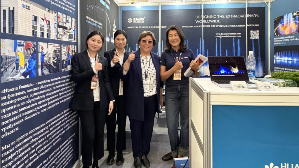 Huaxin Fountain team with a client at KyrgyzBuild 2026 in Bishkek