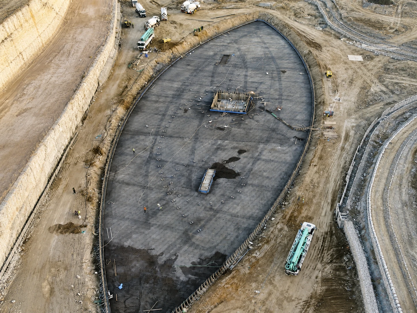 Wide drone view of the Valley Resort dancing fountain construction site in Abha, Saudi Arabia