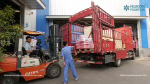 Fountain equipment being loaded for shipment to Manas International Airport in Kyrgyzstan