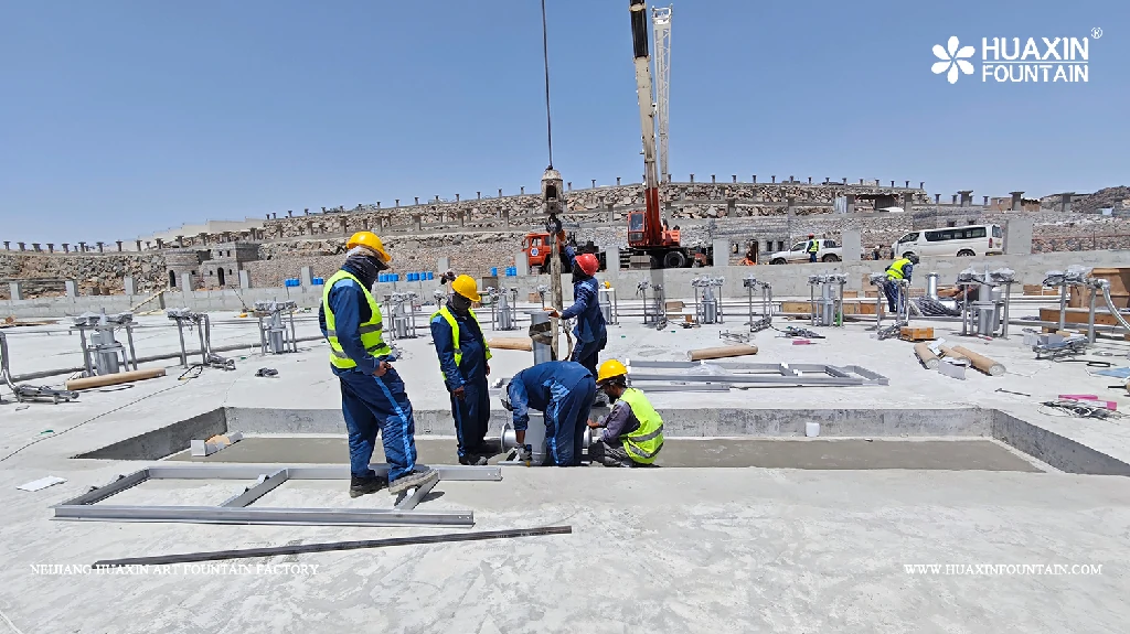 Fountain installation work at the Valley Resort project site in Wadi Bin Hashbal, Saudi Arabia