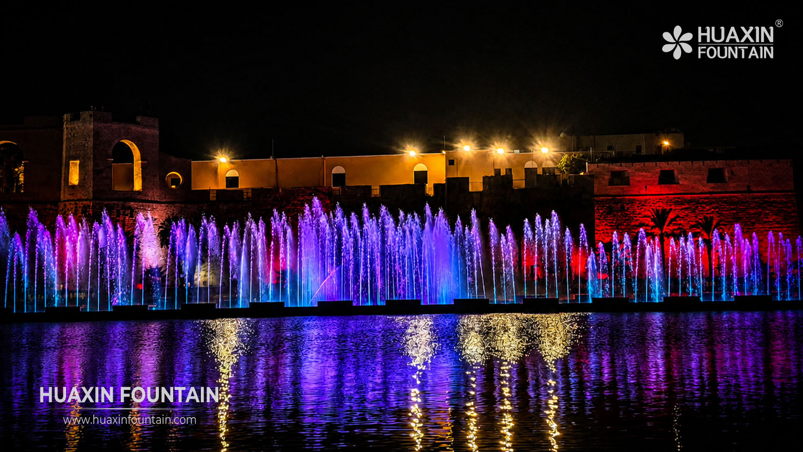 Nighttime water display at the Al-Saraya Al-Hamra Lake fountain in Libya