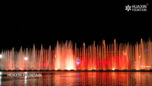 Chasing and running fountain jets along the 100 m Al-Saraya Al-Hamra Lake fountain