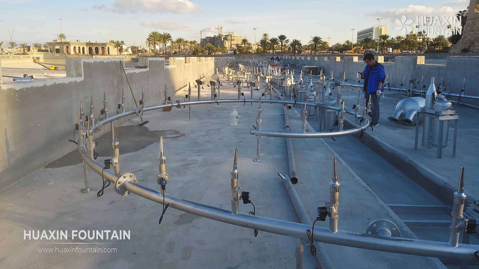 Fountain pipeline installation at the Al-Saraya Al-Hamra Lake project