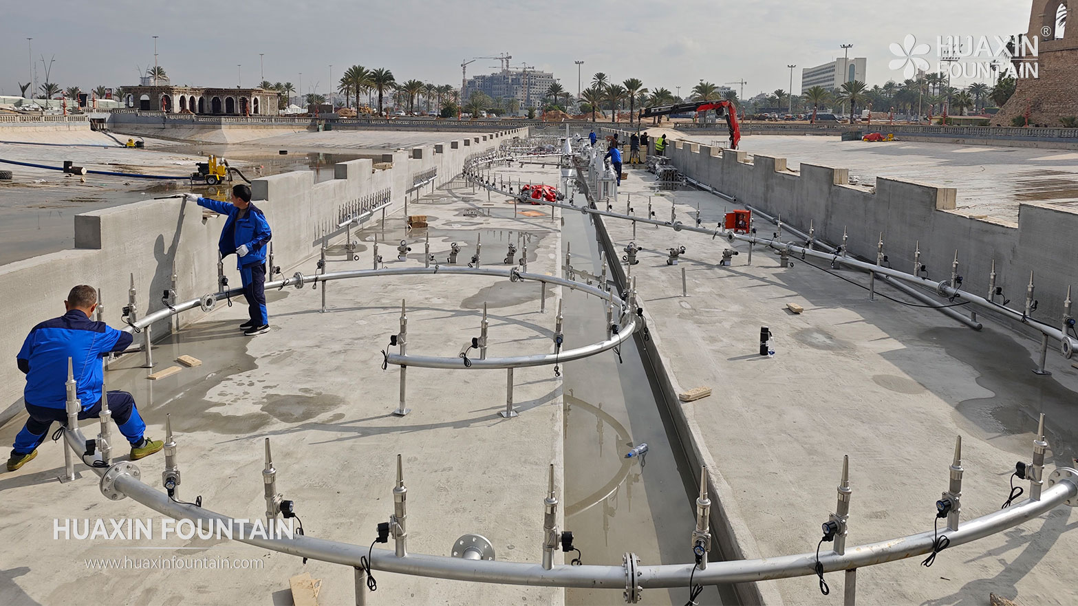 On-site assembly of fountain equipment at Al-Saraya Al-Hamra Lake