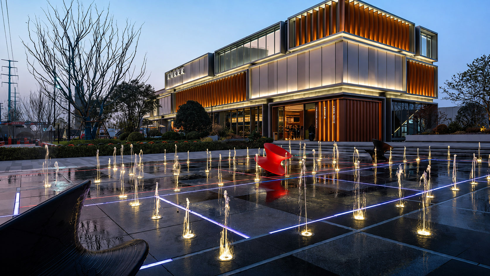 Dry deck fountain integrated with paving and surrounding architectural landscape