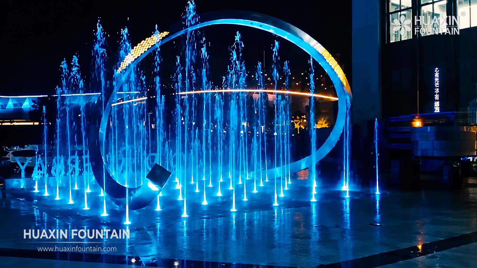 Dry deck fountain for a real estate development and community plaza