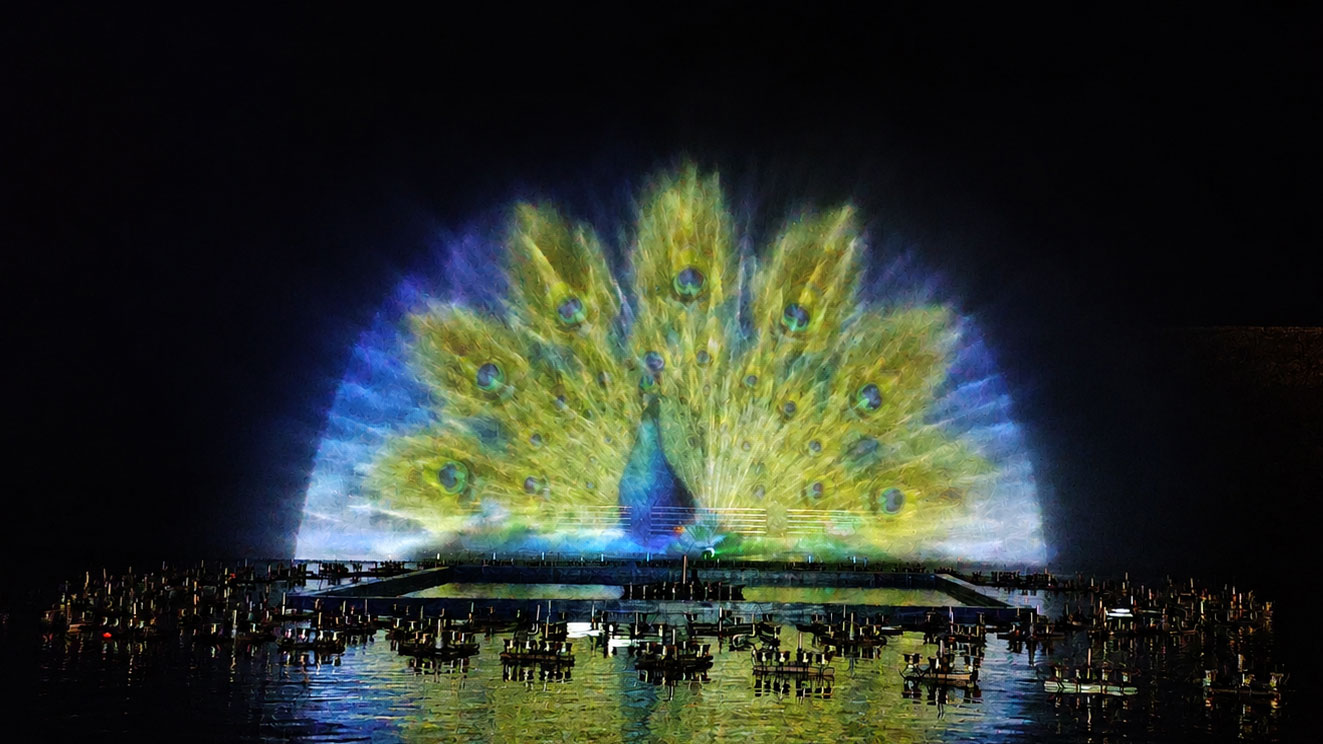Fan-shaped water screen projection show at Valley Resort in Wadi Bin Hashbal, Aseer, Saudi Arabia